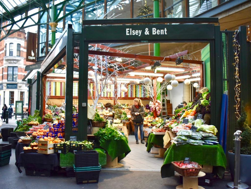 A produce shop at Borough Market, London inspires wanderlust for an English holiday ramble. (Image © Joyce McGreevy)