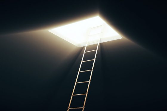 Ladder to an escape opening, not typical of escape rooms around the world where cultural encounters and life lessons abound. (Image © Peshkov/iStock.)