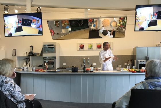 Chef Hubert Hohler at the Buchinger-Wilhelmi clinic in Germany demonstrating healthy recipes for a cultural encounter with healthy eating. (Image © Meredith Mullins.)