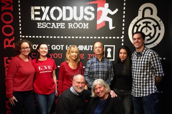 Group including Meredith Mullins, Jerry Fielder, Alexandra Roden, Patricia Roden and others in the Exodus Escape Room in Monterey, California, one of the escape rooms around the world that offers cultural encounters and life lessons. (Image © Exodus Escape Room.)