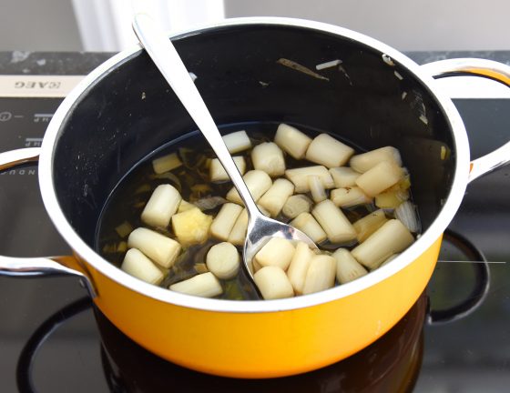 White asparagus in a pot, one of the healthy recipes of Chef Hubert Hohler of the Buchinger-Wilhelmi clinic in Germany, showing a cultural encounter with healthy eating. (Image © Meredith Mullins.)