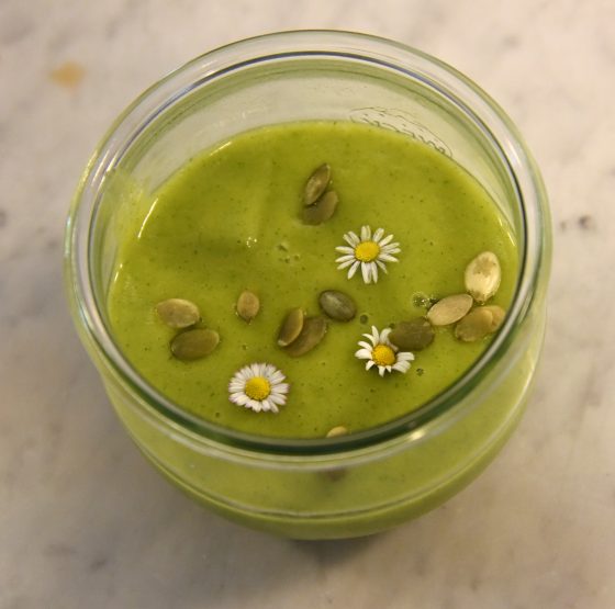 Green wild herb soup with flowers, a soup for healthy eating showing a cultural encounter with healthy recipes. (Image © Meredith Mullins.)