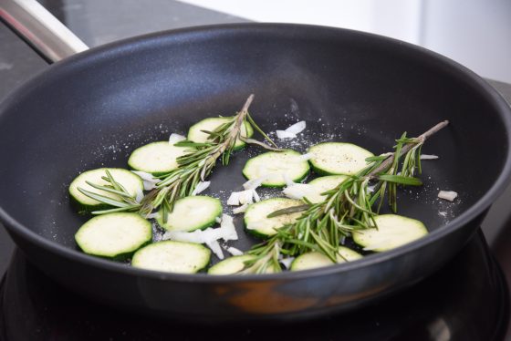 Pan with zucchini and rosemary, a healthy recipe from chef Hubert Hohler of the Buchinger-Wilhelmi clinic in Germany, showing a cultural encounter with healthy eating. (Image © Meredith Mullins.)