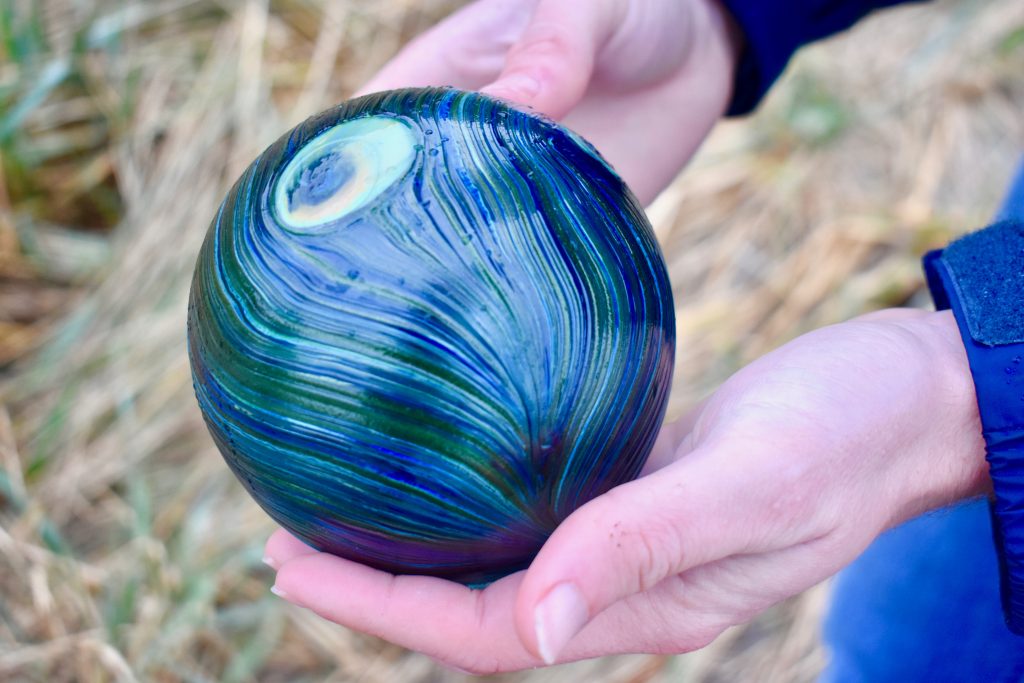 A glass float made for Finders Keepers in Lincoln City reflects a cultural tradition of the Oregon coast. (Image © Joyce McGreevy)