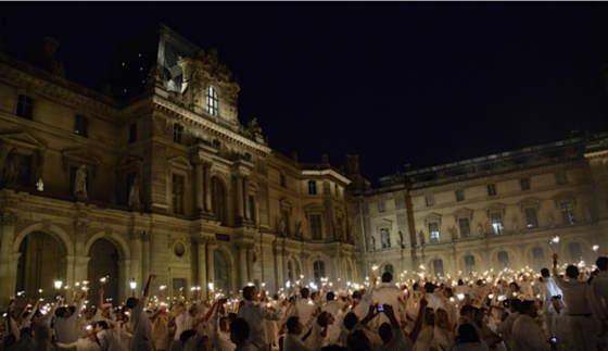 2013 Paris Dîner en Blanc at the Louvre, showing the cultural traditions of the Dinner in White. (Image © Meredith Mullins.)