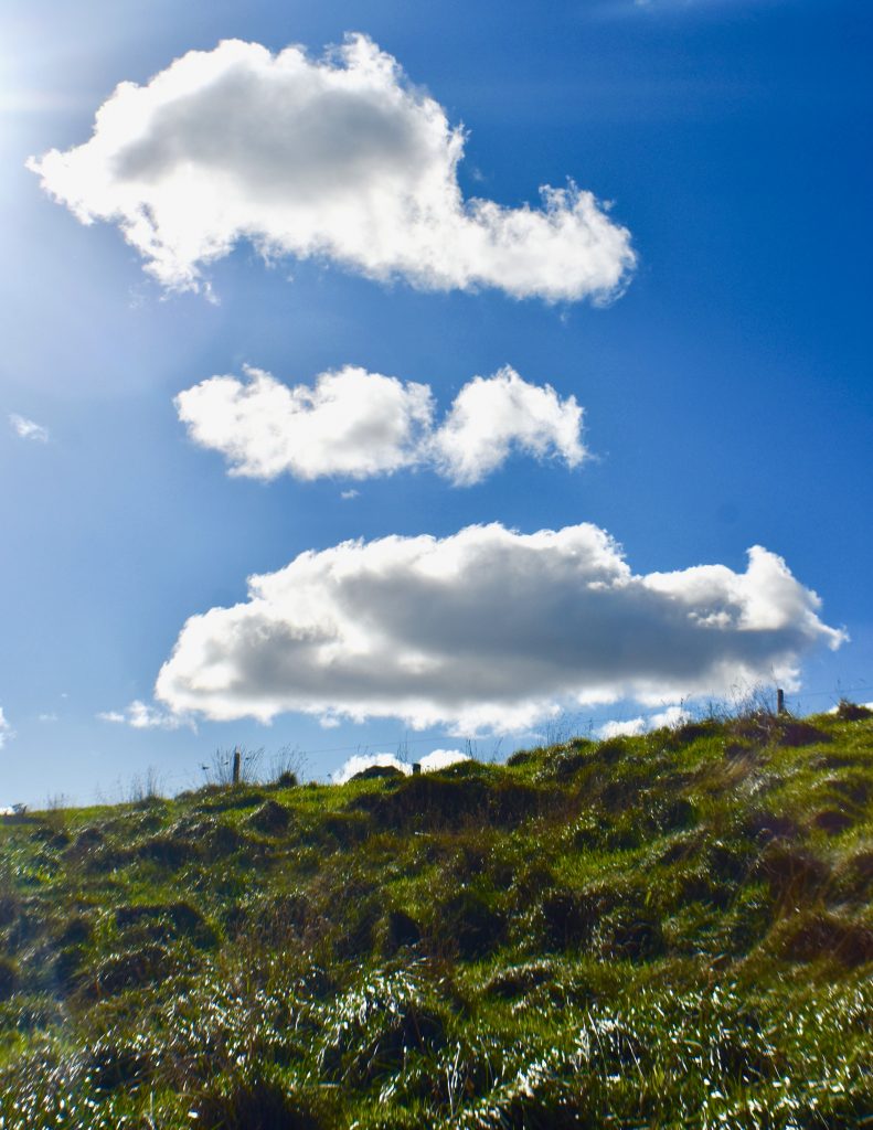 Clouds above the Old Coach Road, Ohakune, Ruapehu evoke memories of a New Zealand travel adventure. (Image © Joyce McGreevy)