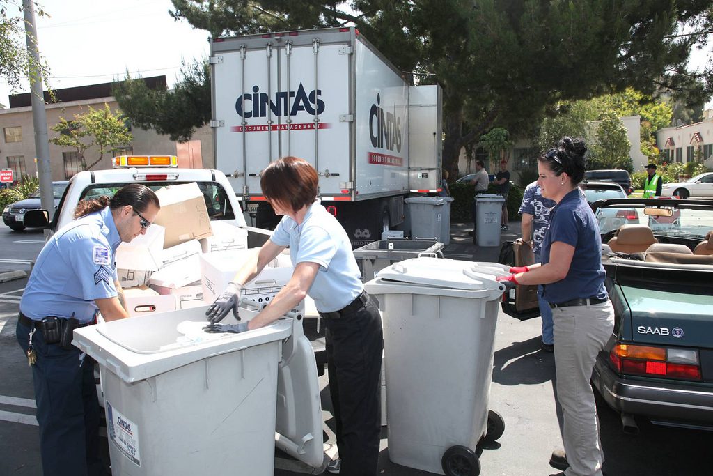 Document shredding/e-waste Roundup in California, a reminder that decluttering is key to becoming a digital nomad. Image by Joshua Barash is licensed under CC BY 2.0.