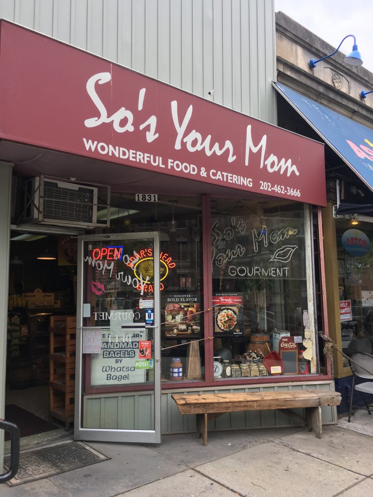 Exterior of So's Your Mom, a deli in Washington, D.C., one more reason for decluttering to become a digital nomad. Image © Joyce McGreevy