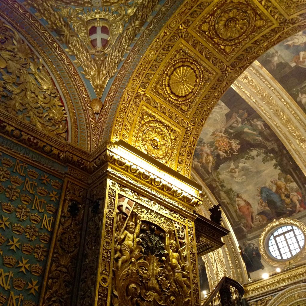 Gold ornamentation on St. John's Co-Cathedral, Valletta, Malta, a rich, visual reward for decluttering to become a digital nomad. Image © Joyce McGreevy