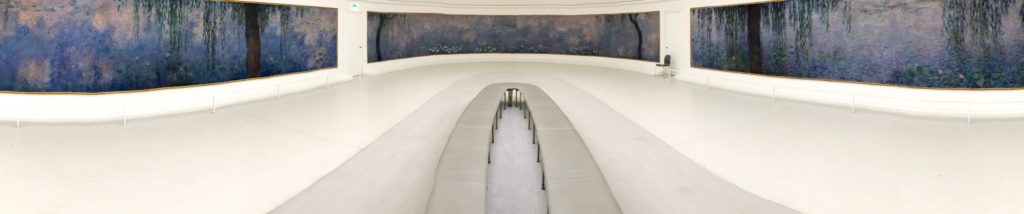 A panorama of Monet's Nymphéas at the Musée de l'Orangerie, travel inspiration for Monet's Giverny Gardens in France. (Image © Meredith Mullins.)