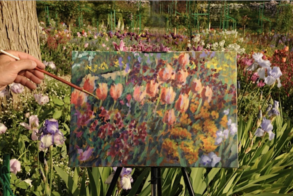 Painting in the Clos Normand, travel inspiration in Monet's Giverny Gardens in France. (Image © Meredith Mullins.)