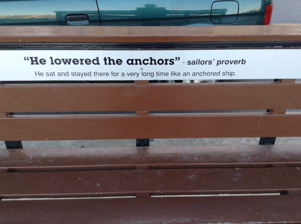 A sailors' proverb on a bench in Senglea, Malta typifies the wordplay, wit, and wisdom of signage in public spaces. Image © Joyce McGreevy