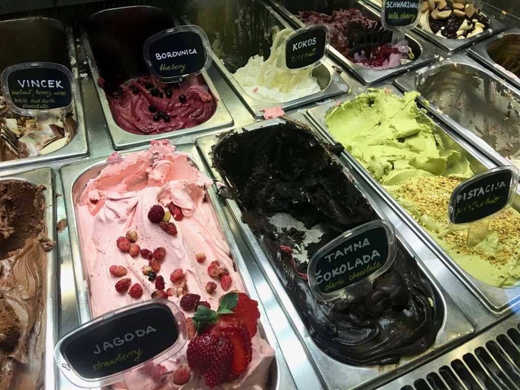 Trays of ice cream with flavors labeled in Croatian suggest a tasty way of learning a second language. (Image © Joyce McGreevy)