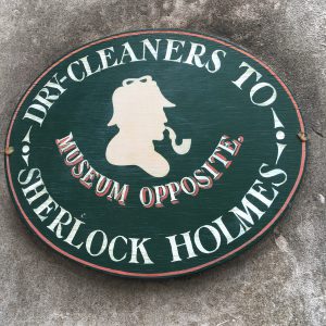 A Sherlock Holmes-themed sign at a dry-cleaners is one of many London details that offer travel inspiration. (© Joyce McGreevy)