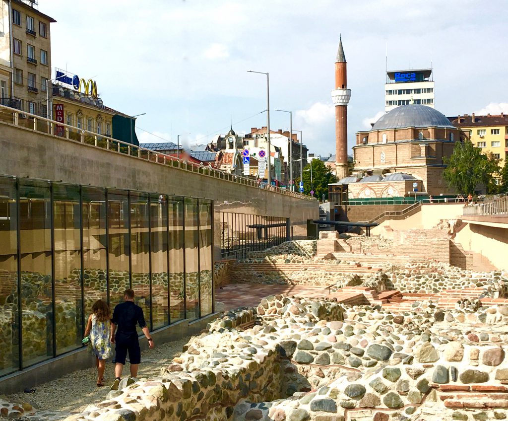 Ancient ruins amid a modern cityscape are one more reason people with wanderlust visit Sofia, Bulgaria. Image © Joyce McGreevy 