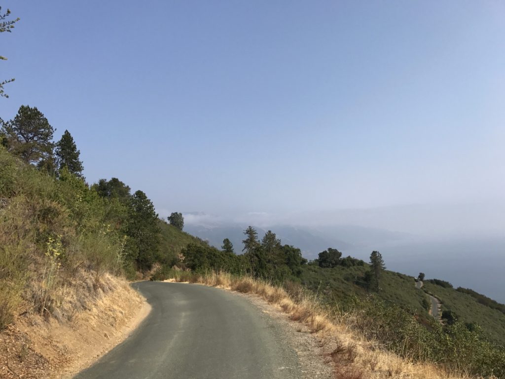 Road int he Big Sur hills near the New Camaldoli Hermitage, a place where seeking silence and challenging cultural traditions of Labor Day are possible. (Image © Meredith Mullins.)