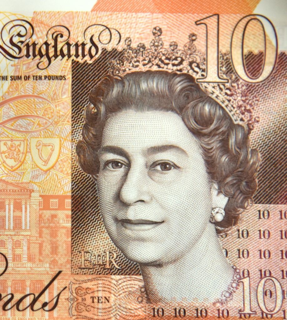 Queen Elizabeth II on the ten-pound world paper money, showing cultural heritage and traditions. (Image © Meredith Mullins.)