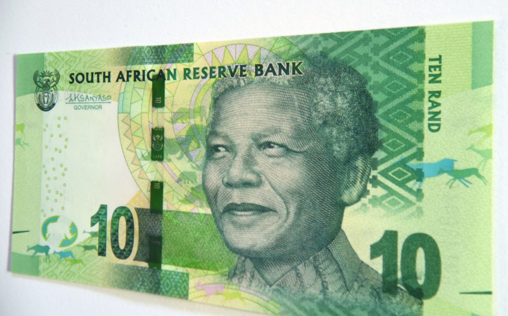 South African paper money with Nelson Mandela, showing cultural heritage and traditions. (Image © Meredith Mullins.)