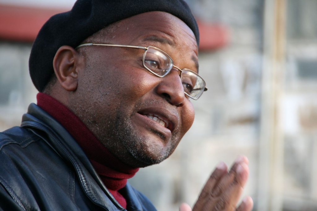 A portrait of Ntando Mbatha, formerly a prisoner at Robben Island, now a tour guide there, signifies how hiring a local guide provides cultural context to travelers in South Africa. Image © Keven A. Seaver