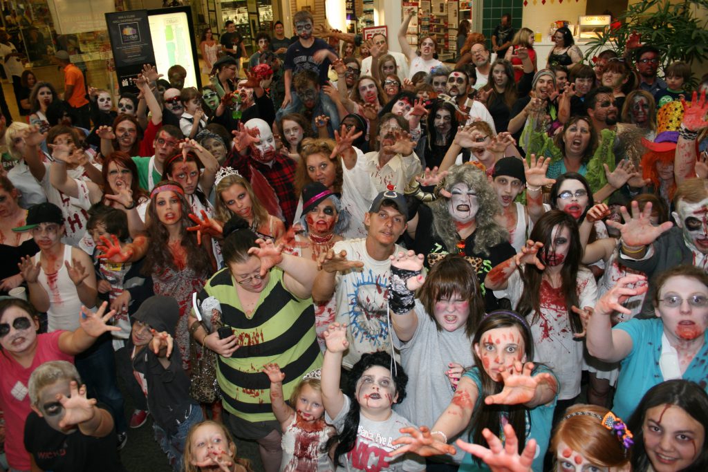 Louisiana revelers create an exciting aha moment at the Halloween Zombie Walk in Shreveport, an example of Halloween around the world. (Image by Shreveport-Bossier Convention & Tourist Bureau) 
