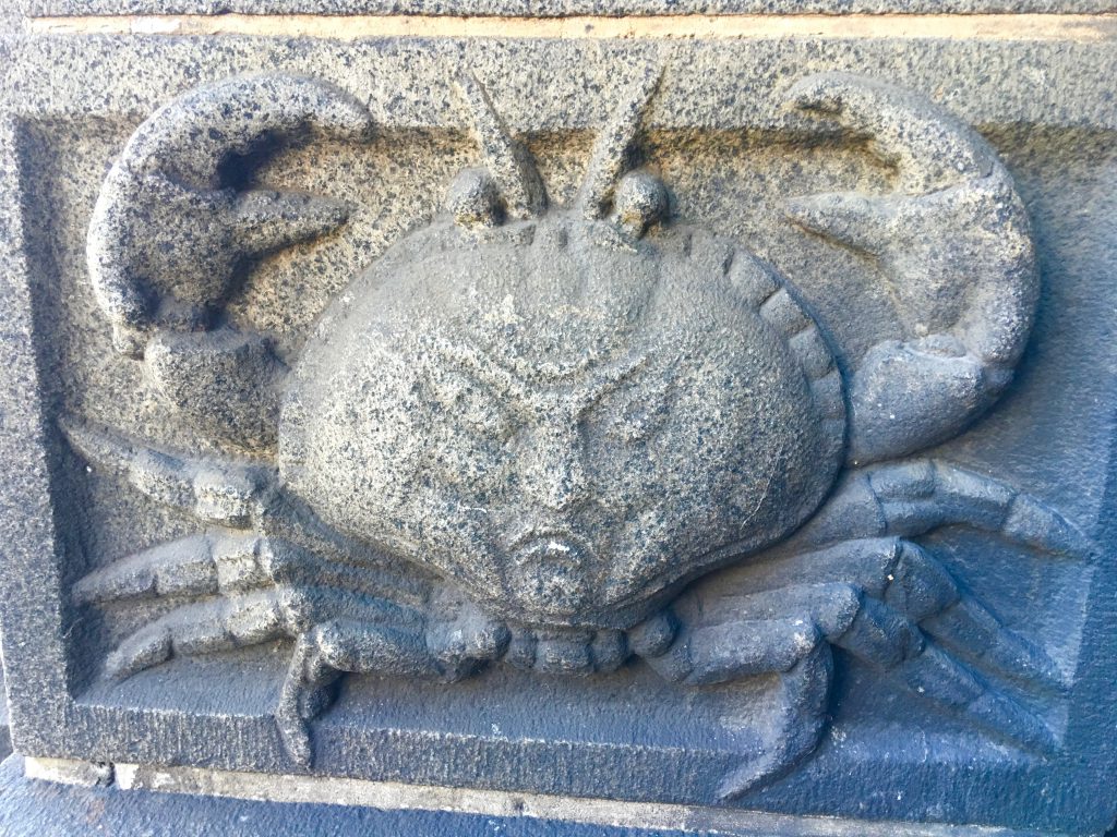 A gargoyle of a crab in Copenhagen shows how humor and creative thinking influence Danish design. (Image © Joyce McGreevy)