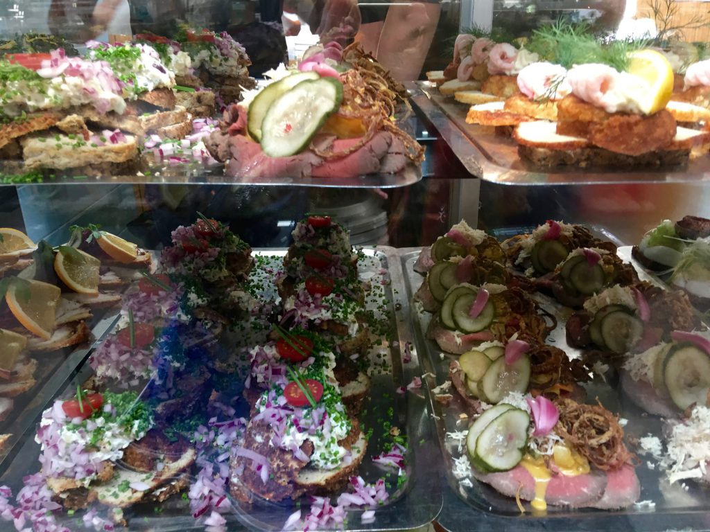 Smørrbrød, or Danish open sandwiches, at Torvehallerne Market, Copenhagen, shows that creative thinking in Danish design extends to Nordic cuisine. (Image © Joyce McGreevy)