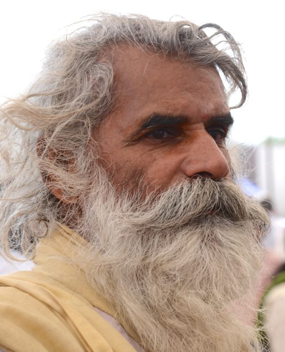 Bearded older man showing the cultural traditions of Japanese wabi sabi and the beauty of age, lending a theme for New Year's resolutions. (Image © Meredith Mullins.)