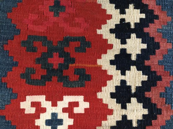 Kilim with orange thread, showing the cultural traditions of Japanese wabi sabi, lending a theme for New Year's resolutions. (Image © DMT.)