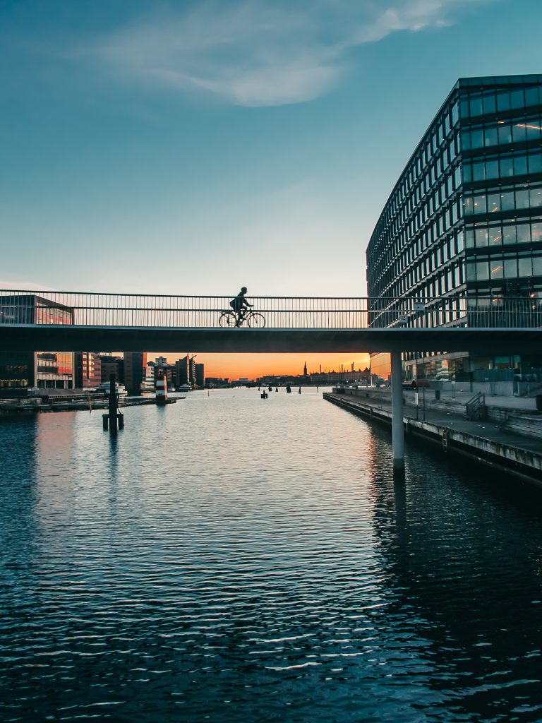 A cyclist crosses a bridge between islands in Copenhagen, an example of the Danish design that makes this city a Capital of Creative Thinking. (Image © Copenhagen Media Center and Thomas Høyrup Christensen)