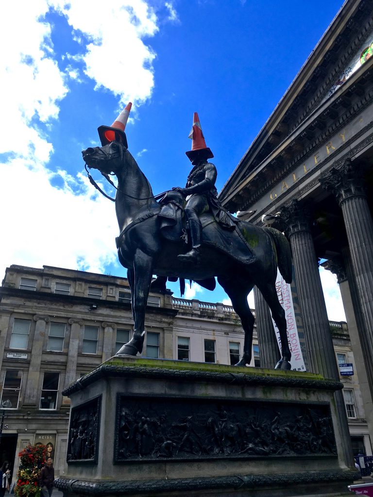 The statue of the Duke of Wellington in Glasgow shows that Scotland's fashions go beyond the wordplay of clothing idioms. (Image © Joyce McGreevy)