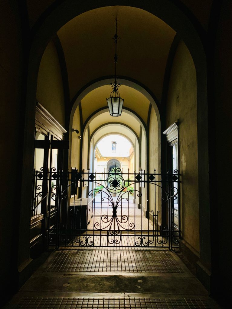 A cancello, or wrought-iron gate in Florence Italy inspires an aha moment about small pleasures and life's little rituals. (Image © Joyce McGreevy)