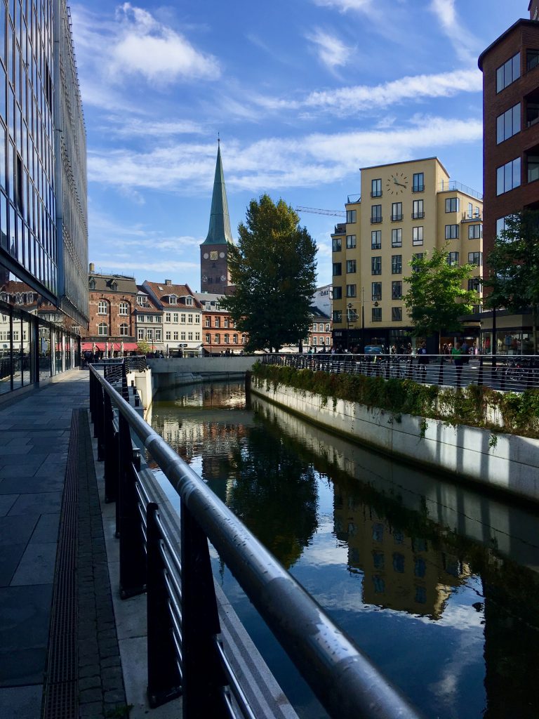 The Aarhus River’s renewed visibility shows how rethinking leads to aha moments, one more reason to celebrate community. (Image © Joyce McGreevy)