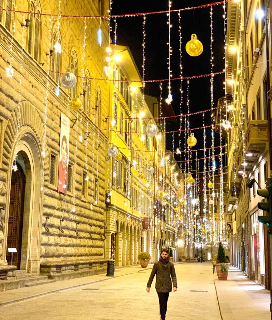 Via de' Tornabuoni, Firenze festooned in gold decorations inspires an aha moments Italian rituals of celebration. (Image © Joyce McGreevy)