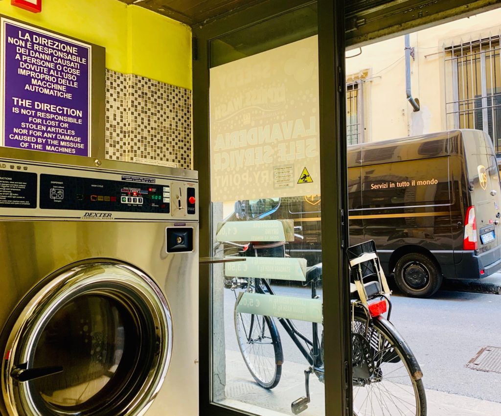 A laundromat in Florence, Italy inspires an aha moment about everyday life and life's little rituals. (Image © Joyce McGreevy)