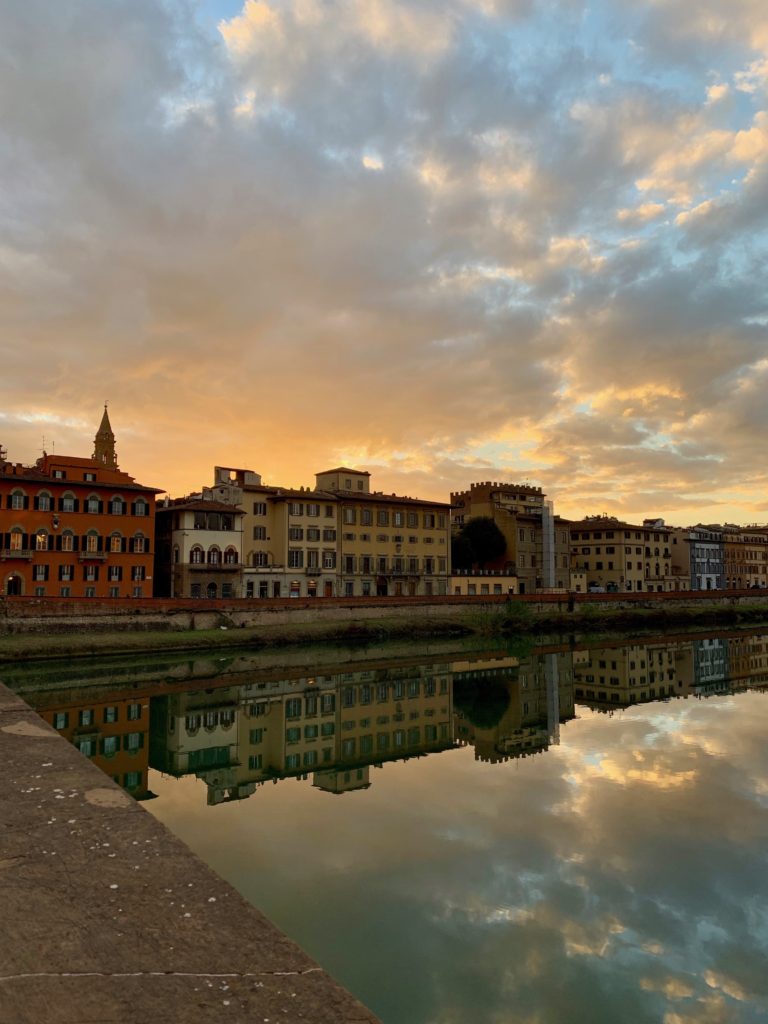 The Arno at sunset in Florence Italy inspires an aha moment about life’s little rituals. (Image © Joyce McGreevy)