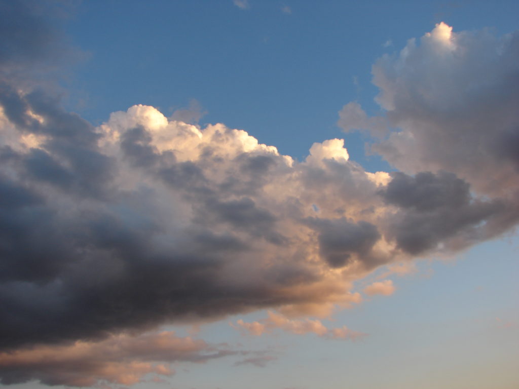 A cloud at sunset, as seen while cloud watching while traveling the world. (Image © DMT.)