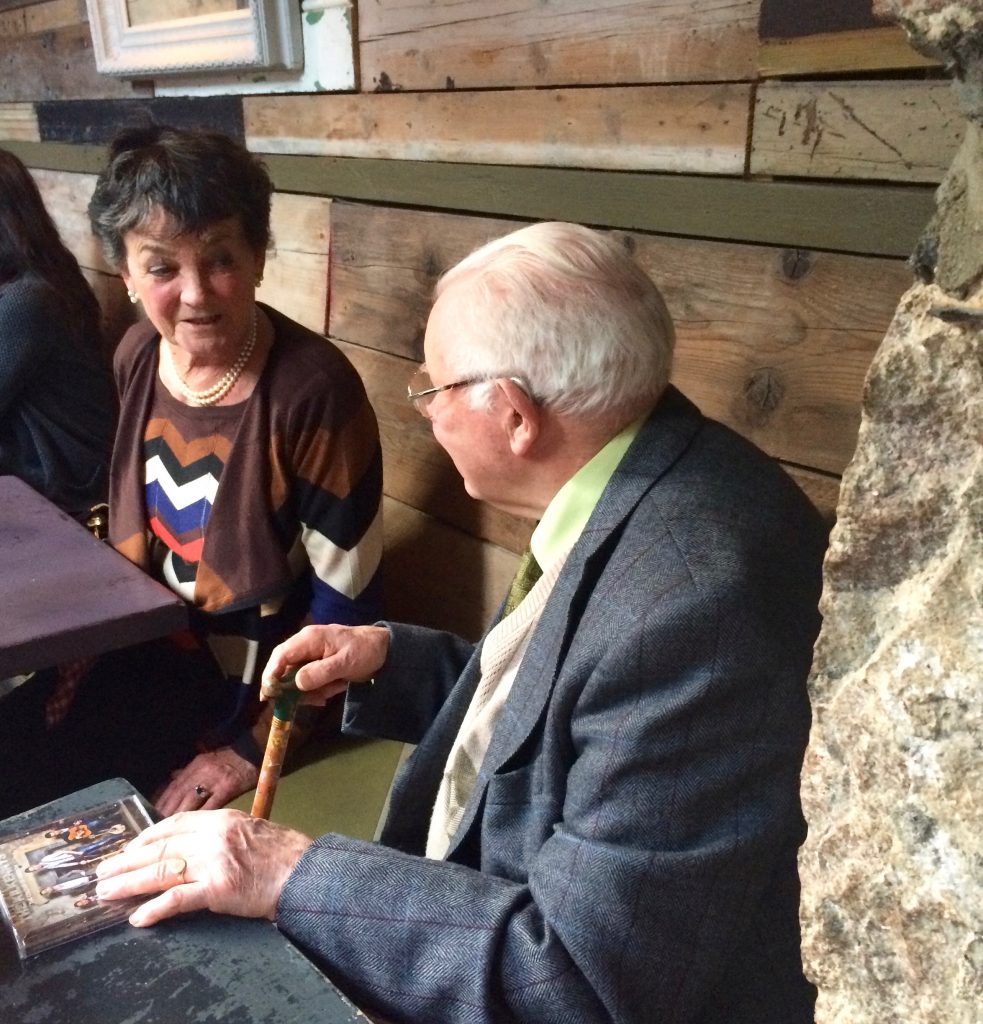 A man and a woman conversing in Ireland shows how saying hello is fundamental across cultures. (Image © Joyce McGreevy)