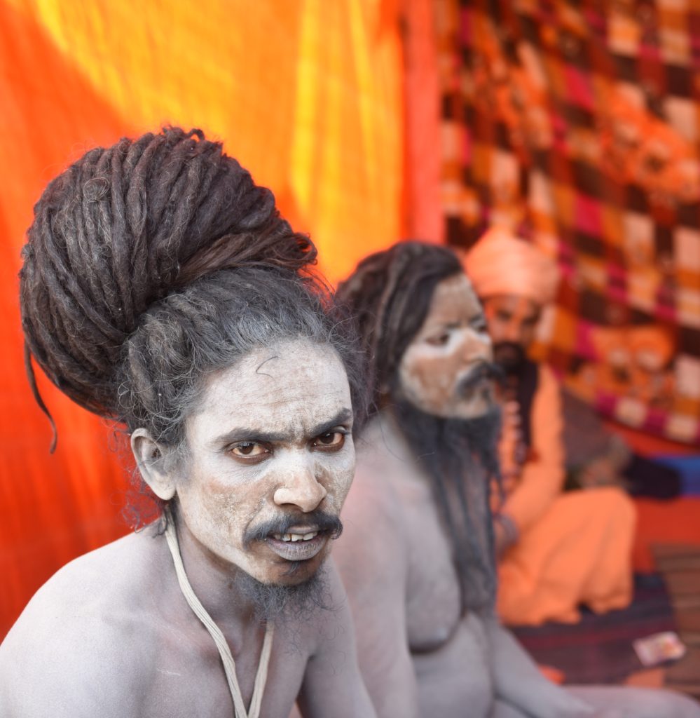 Naga sadhus at the 2019 Ardh Kumbh Mela in Prayagraj (Allahabad), India, one of the amazing places in the world (Image © Meredith Mullins.)