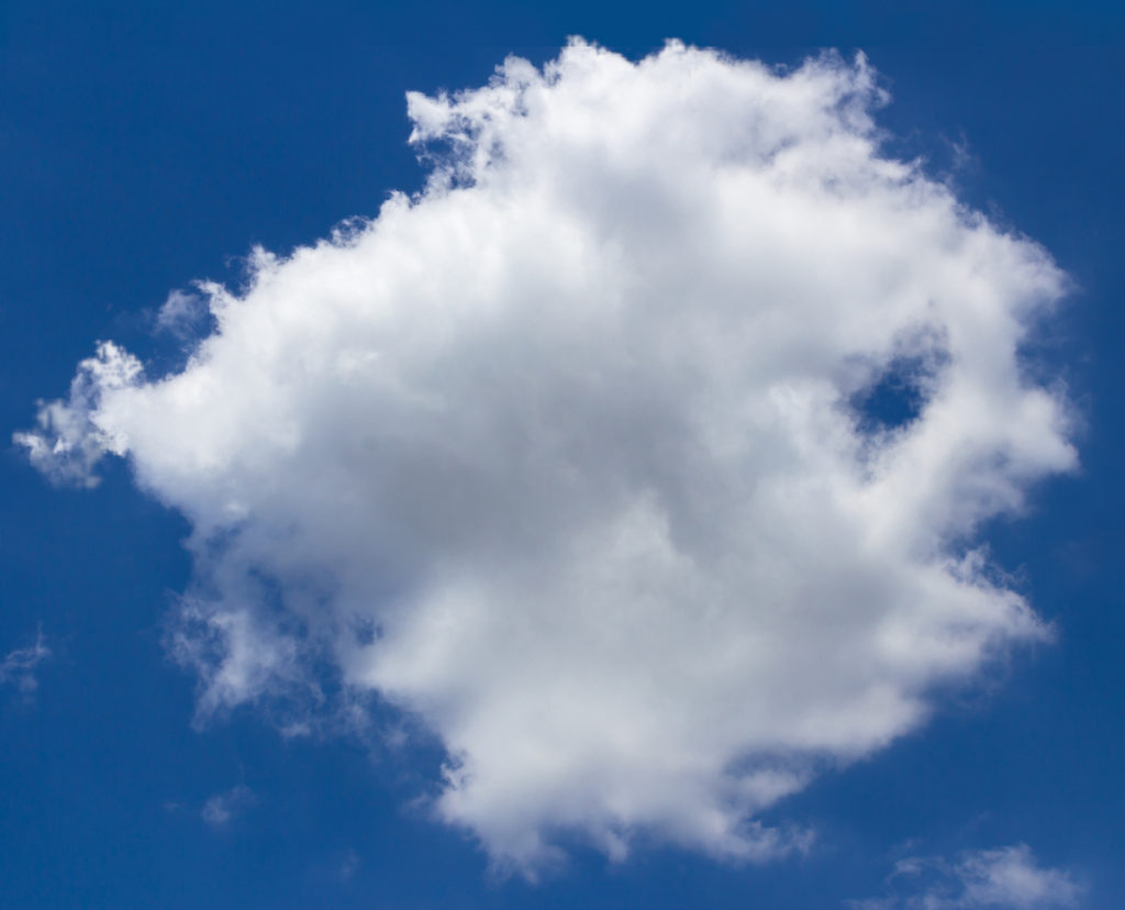 Cloud in the shape of a fish, cloud watching while traveling the world. (Image © Germi_p/iStock.)
