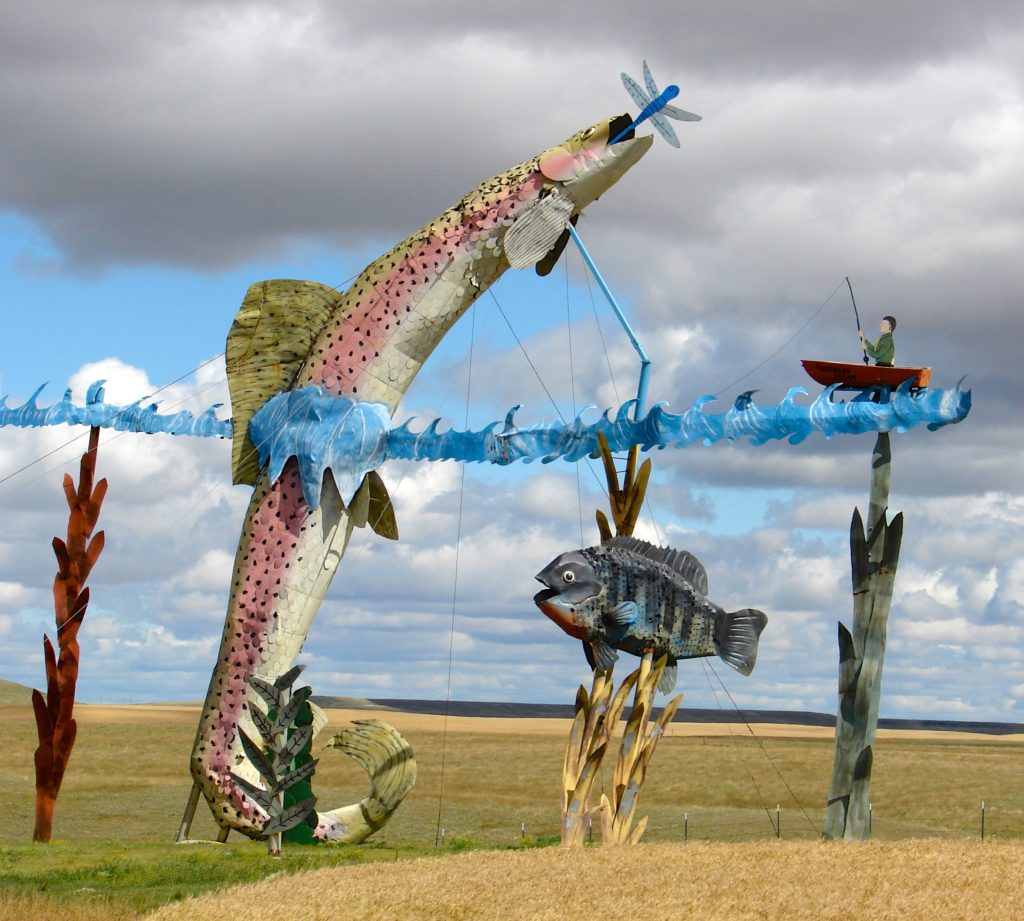 The Enchanted Highway in North Dakota, one of the road signs and roadside attractions that encourages the art of travel. (Image © DMT.)