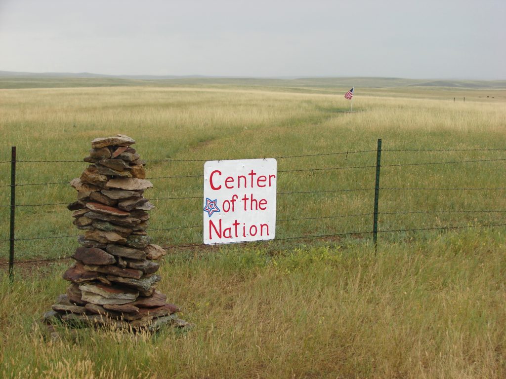 Center of the Nation sign, a roadside sign that invites the art of travel. (Image © DMT.)