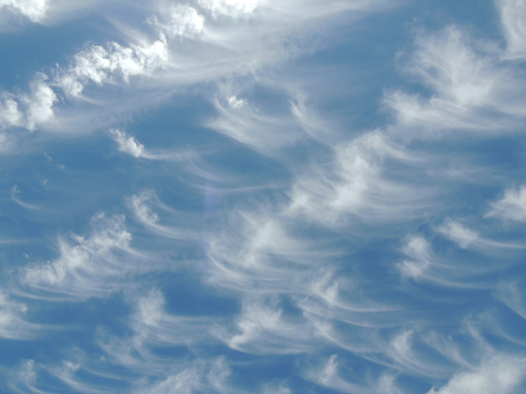 Cirrus clouds, as seen when cloud watching while traveling the world. (Image © DMT.)