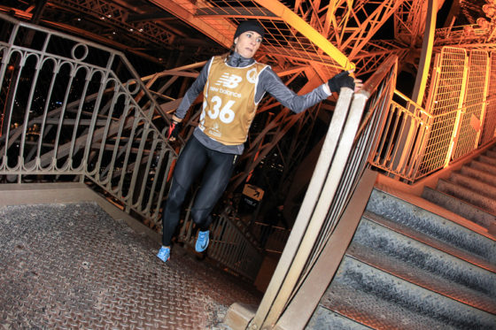 ECOTRAILORGA_ANTHONYCHAUMONTEL_VTE2019_Suzy Walsham running in the Eiffel Tower Vertical race at one of the most amazing places on earth. (Image courtesy of the EcoTrail Organization.)