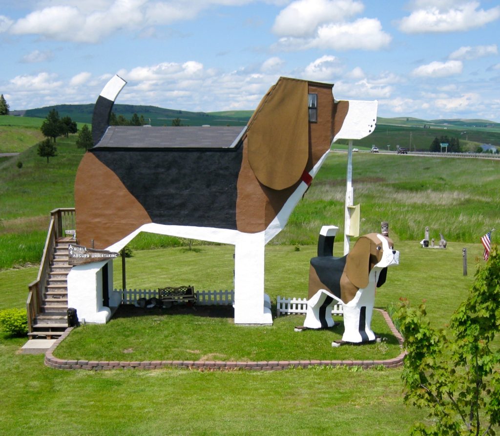 The Dog Bark Park Inn in Cottonwood, Idaho, a roadside sign and roadside attraction, encouraging the art of travel. (Image courtesy of Dog Bark Park Inn.)