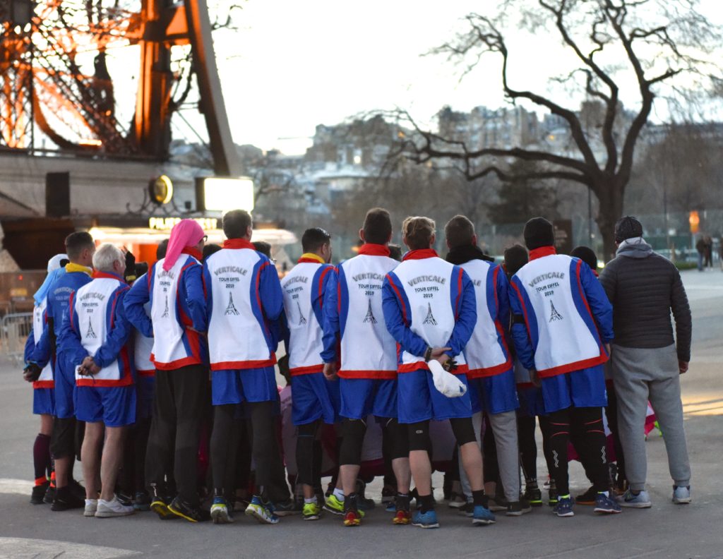 Group of runners at the 2019 Eiffel Tower Vertical race at one of the most amazing places on earth. (Image © Meredith Mullins.)