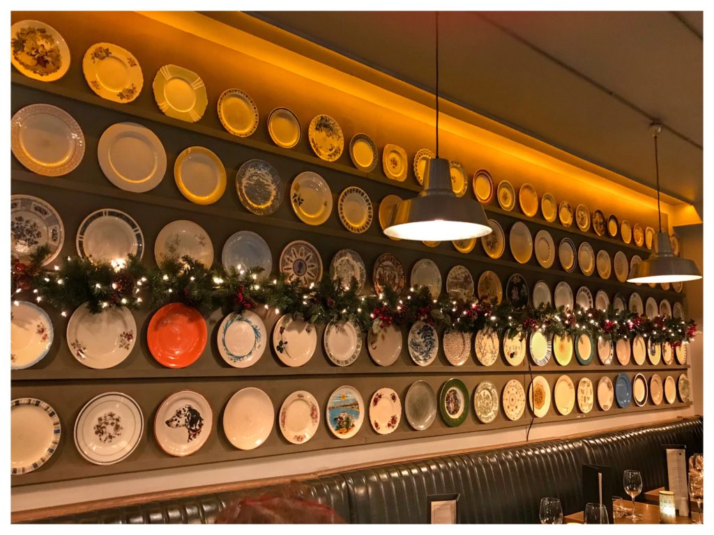 A display of plates at a restaurant in Dublin, Ireland evokes the way Ireland’s culinary renaissance has dispelled stereotypes about Irish cuisine. (Image © Carolyn McGreevy)