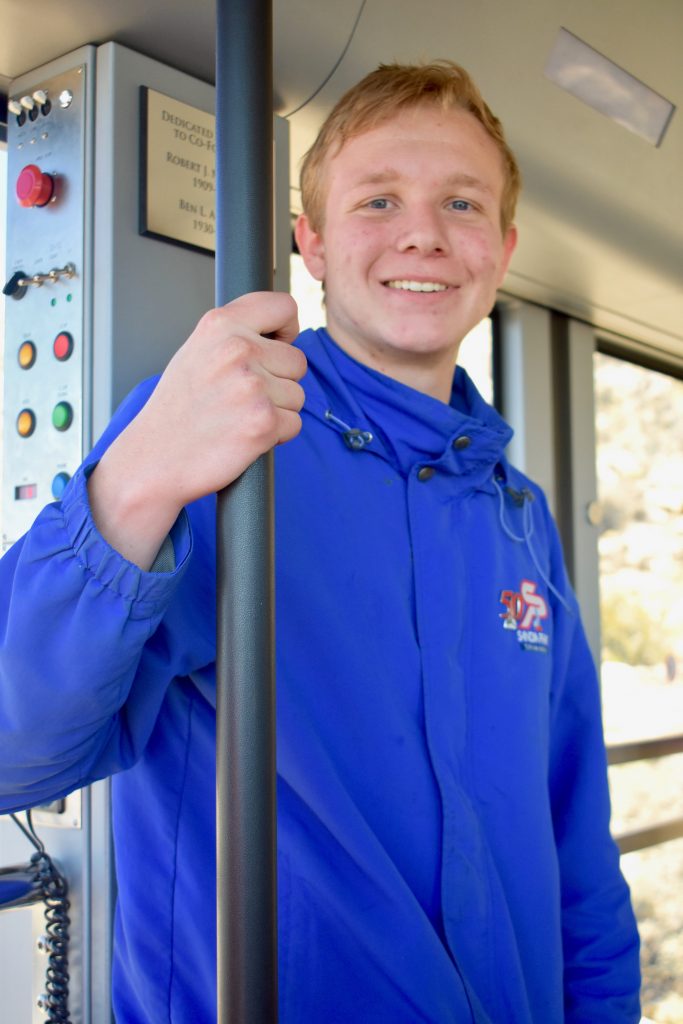 Spencer, a guide at Sandia Peak Tramway, finds Albuquerque, New Mexico awe-inspiring. Image © Joyce McGreevy