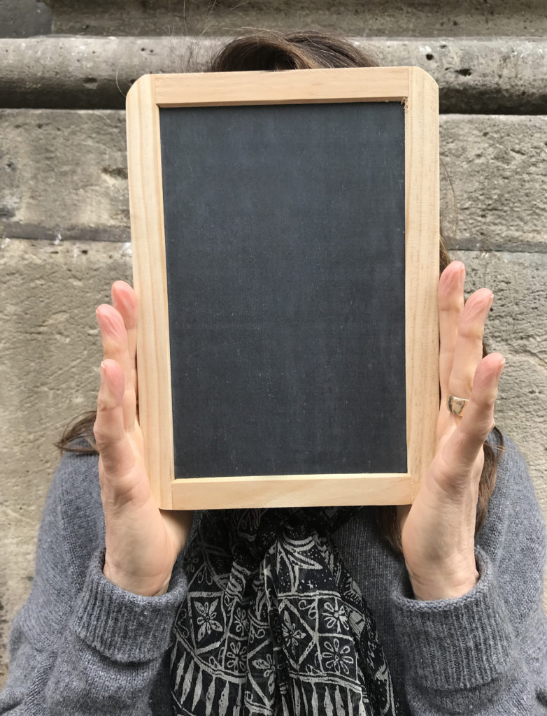 A clean slate tablet showing the idiom of starting over with a clean slate, one of the popular proverbs and sayings in the English language. (Image © Meredith Mullins.)