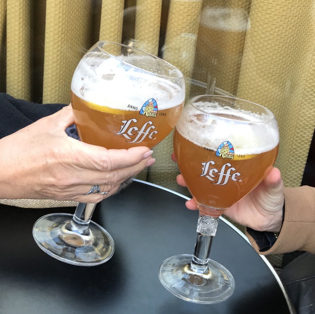 Beer glasses showing the idiom mind your Ps and Qs, one of the popular proverbs and sayings in the English language. (Image © Meredith Mullins.)