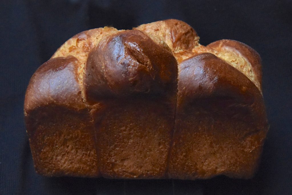 Loaf of bread showing the idiom upper crust, one of the proverbs and sayings that is popular in the English language. (Image © Meredith Mullins.)